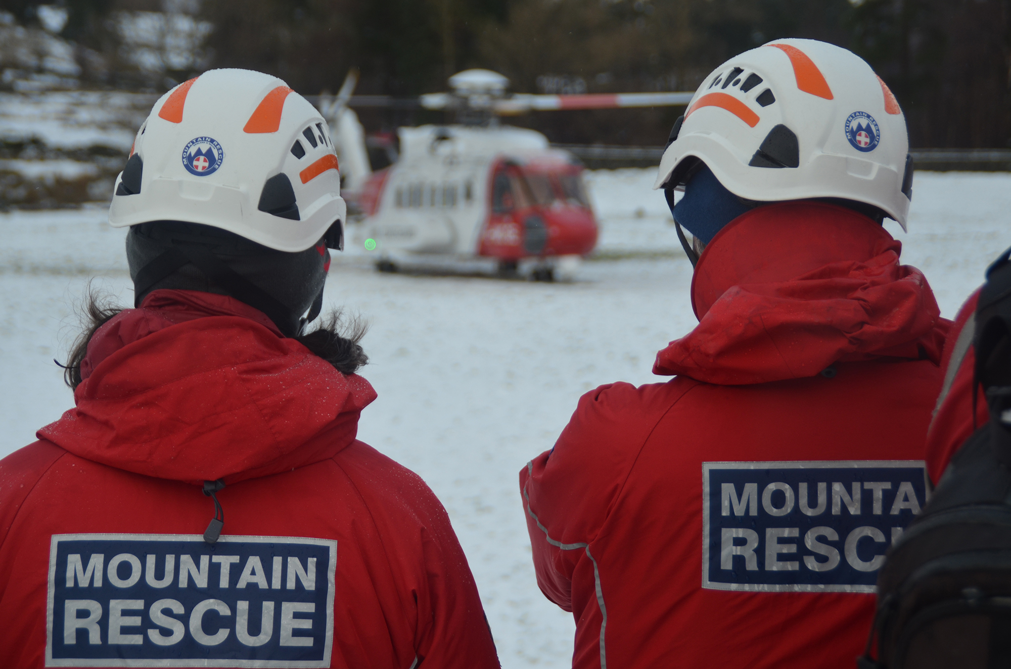 Coastguard helicopter with Lakes team members during training